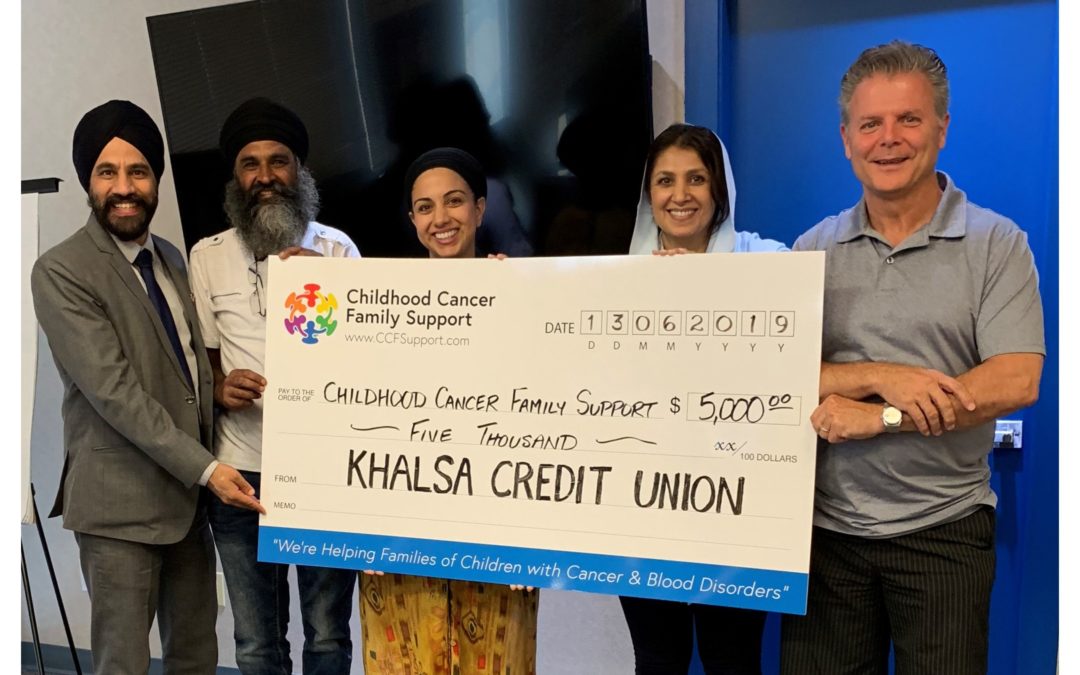 Khalsa Credit Union presents CCFSupport with a cheque